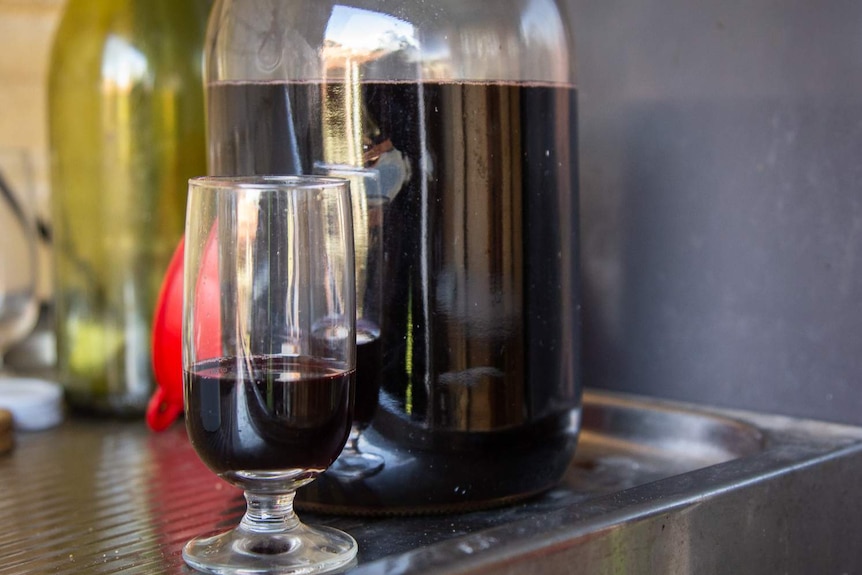 Wine made without preservatives at home in Perth.