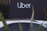 Uber logo seen on the outside of a building 