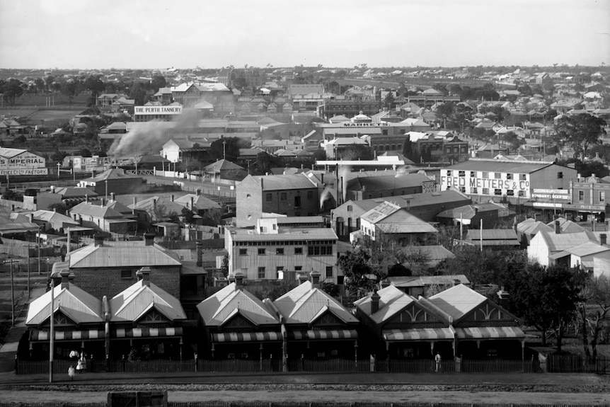 Black and white photo of houses and businesses in West Perth, c1905