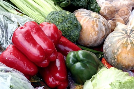 Farmers sell fruits and vegetables.