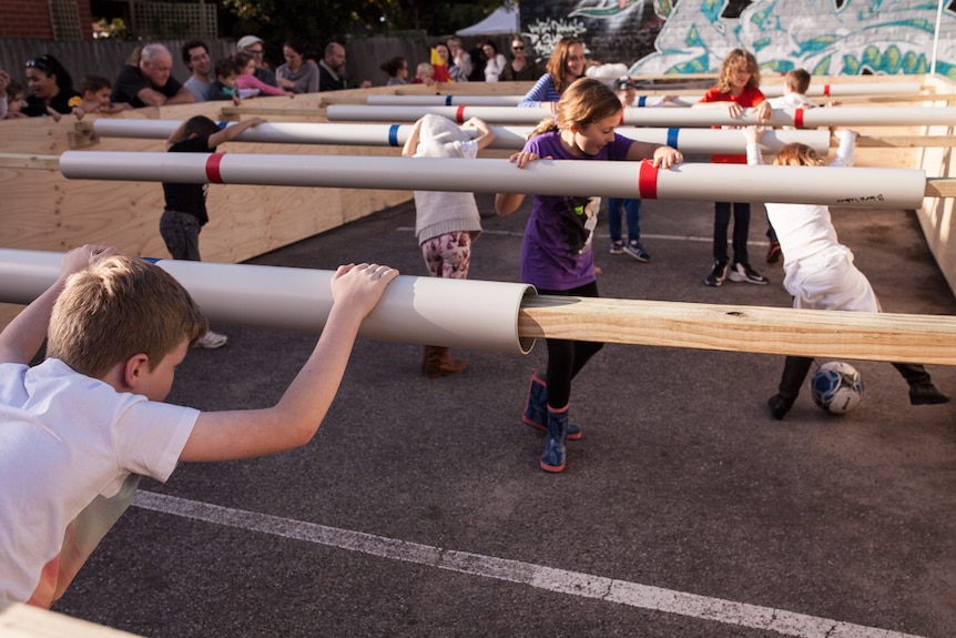 Spaced out's human foosball table in action