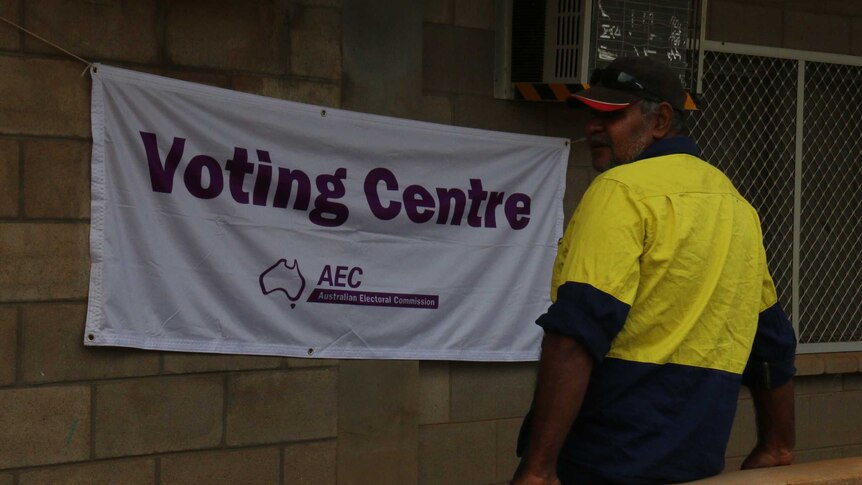 A man outside a makeshift voting centre.