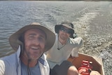 Two men in a boat.