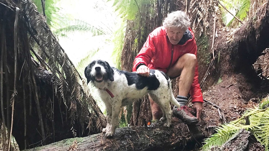 Bruce Fairfax, photographed with his dog.