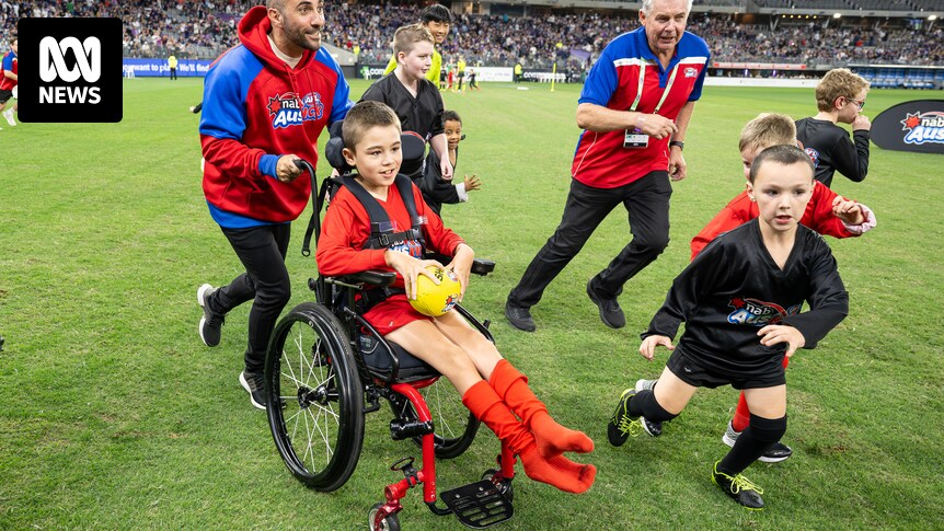Effort to widen footy accessibility puts outback players in front of huge Perth Stadium crowd