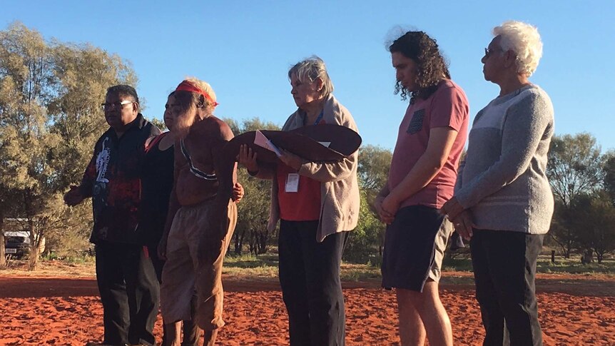 Five people read the statement in Uluru.