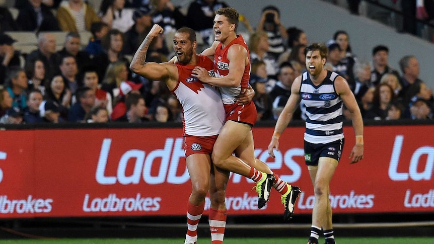 Lance Franklin and Tom Papley celebrate a goal