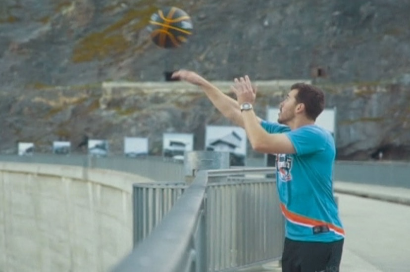 Australian Derek Herron prepares to shoot the ball from the top of a dam in the Swiss Alps.