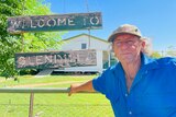 Tom King standing in front of 'welcome to Glendilla' sign.