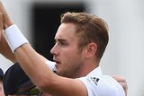 On fire ... Stuart Broad is mobbed after taking the wicket of Australia opener Chris Rogers