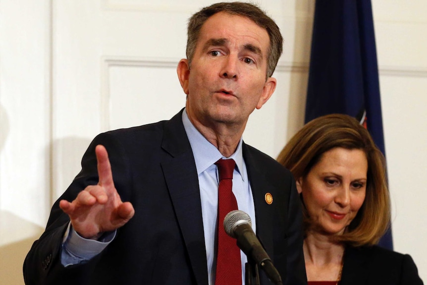 Ralph Northam at a press conference with his wife Pam Northam