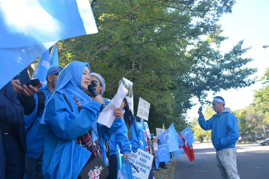 Woman speaks during a protest.