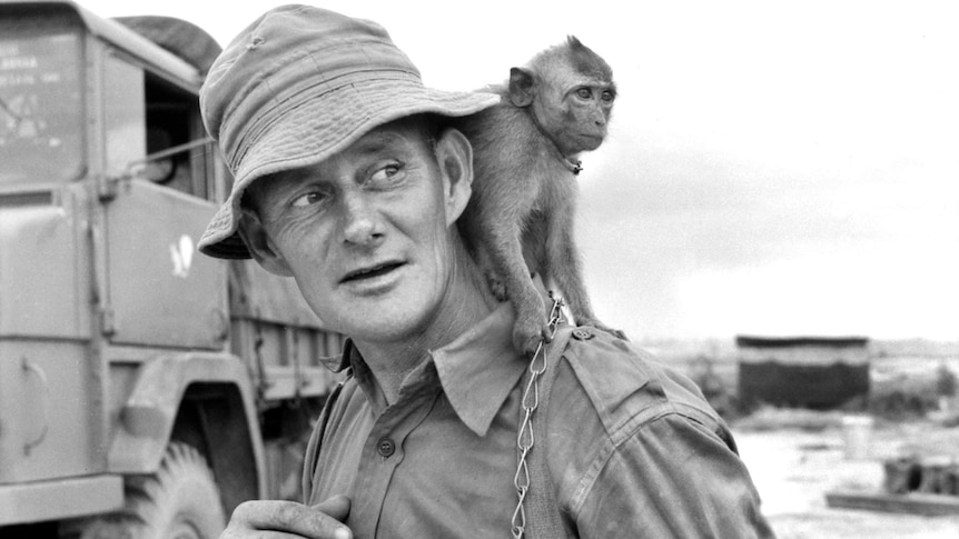 Monkey on soldier's shoulder in Vietnam 1965.