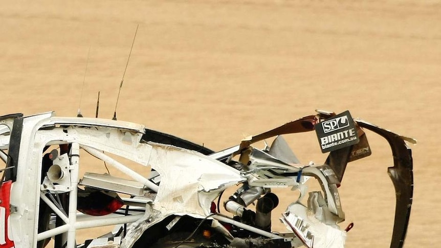 Prang of the Mountain...Fabian Coulthard walked away unhurt but his Commodore was another story.