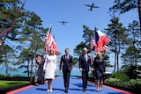 Joe Biden and Emmanuel Macron on D-Day in Normandy. 