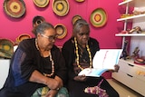 Tjulpu and Walpa authors Margaret Smith and Rene Kulitja read through their new book.
