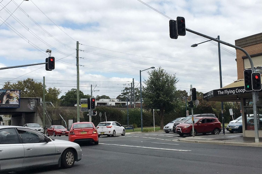 Cars turn from Sphinx Avenue onto Marvo Avenue.