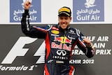 Leaping for joy ... Sebastian Vettel was back on top in Bahrain
