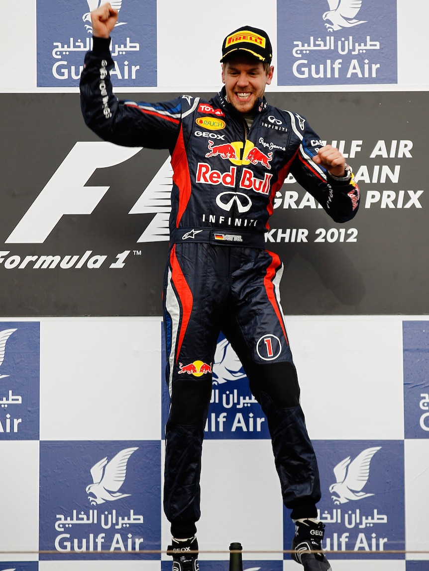 Leaping for joy ... Sebastian Vettel was back on top in Bahrain