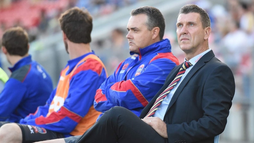 Phil Stubbins watches on during Newcastle Jets match