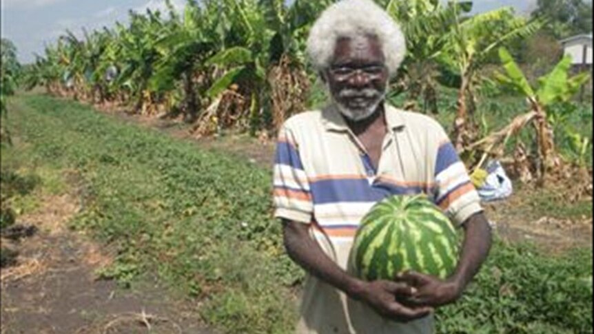 Bundy Namaraanyilk shows off a watermelon