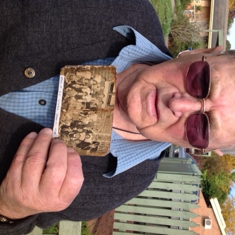 Ray Prosser holds his 1938 school photo