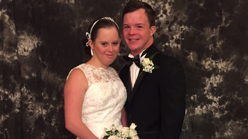 Queensland couple Taylor Anderton and Michael Cox pose for a photo at the Debutante Ball for young women with disabilities