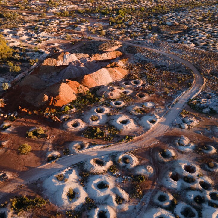 an aerial view of the outback town of White Cliffs with opal mine shafts dominating the landscape