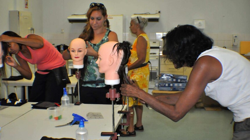 Aboriginal women in Halls Creek are being trained in hairdressing, May 2014