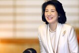 Japan is seeking an apology from Australian investigative journalist Ben Hills over his book about Princess Masako (R). (File photo)