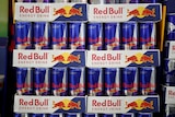 Crates of Red Bull in a supermarket