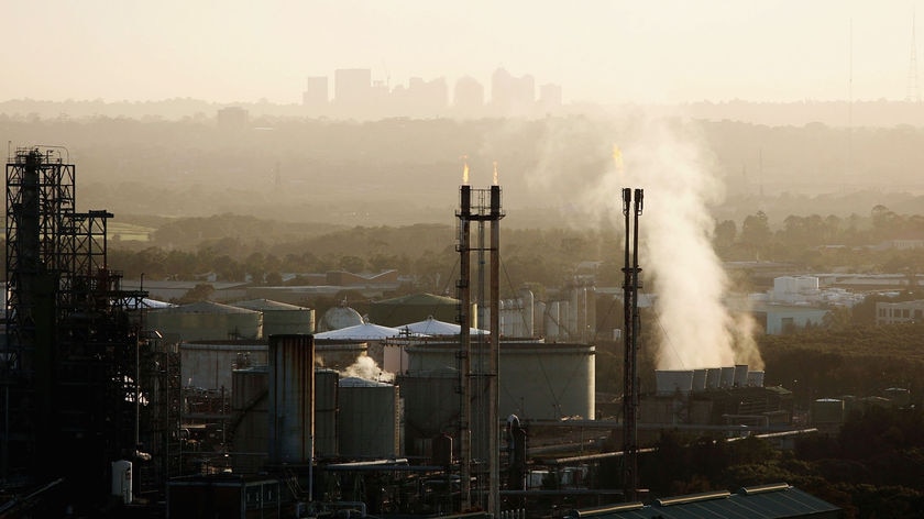 An oil terminal in Sydney emitting smoke