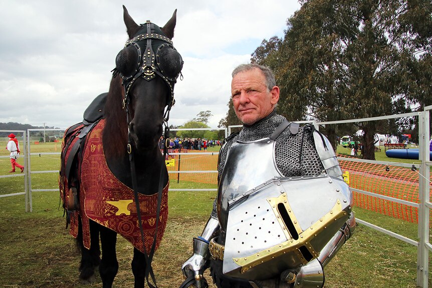 Darrell Bossley with his jousting horse.