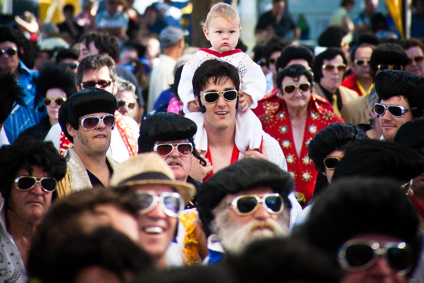 Elvis Presley impersonators gather for the Guinness World Record for the largest gathering of Elvis Presley impersonators.