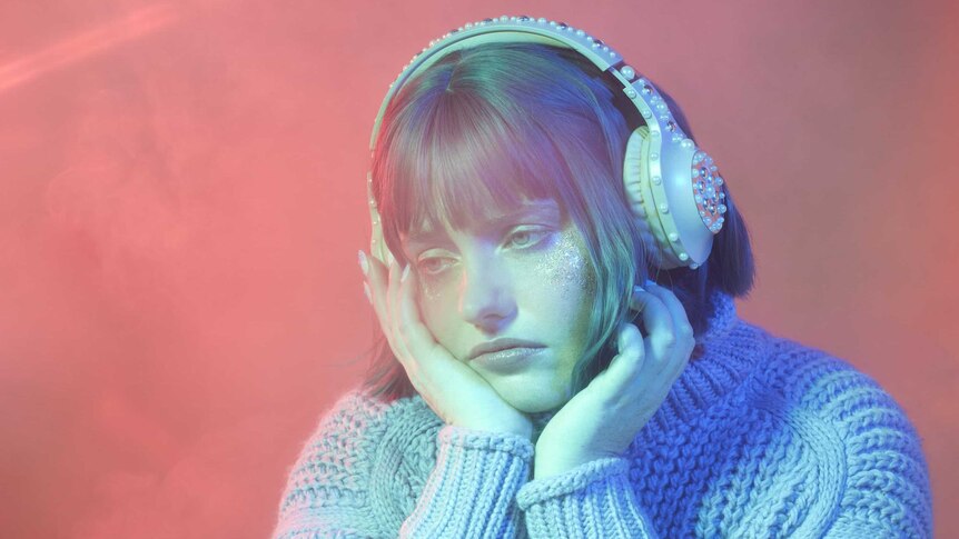 A woman with headphones