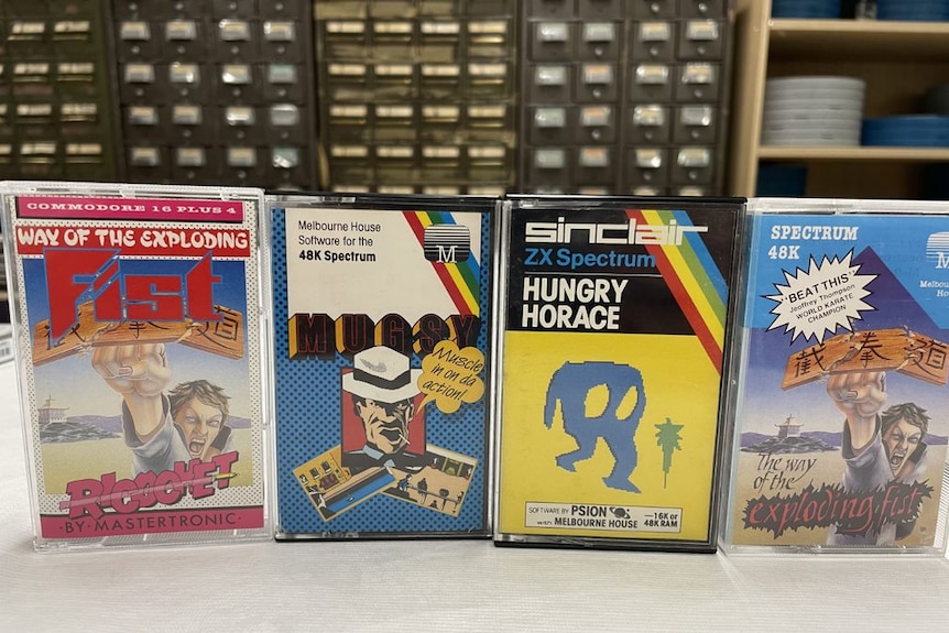 Four retro video games cases