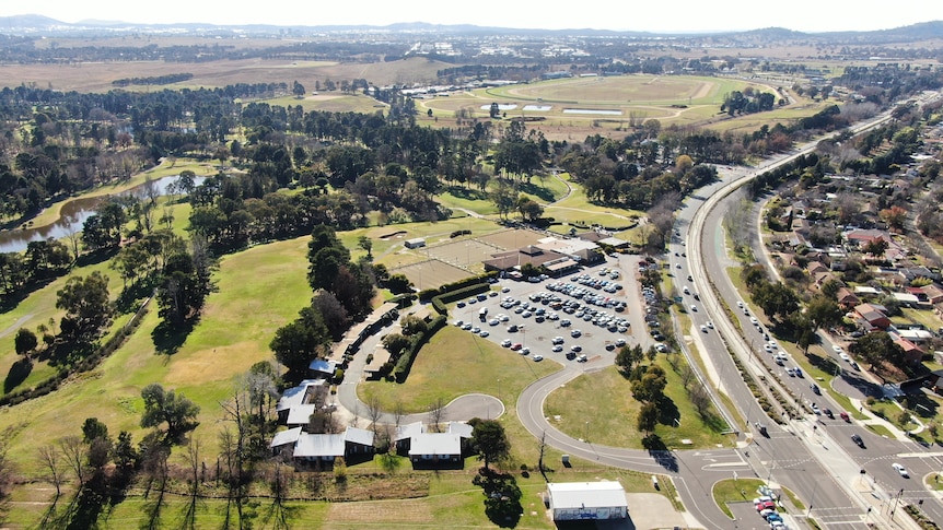 An aerial view of the golf club and the main road through Lyneham.