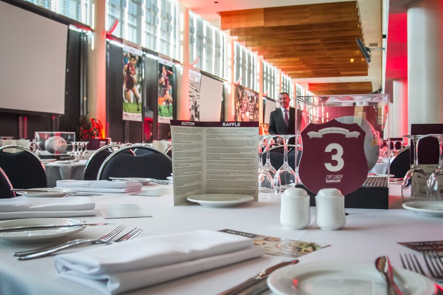Simon Camp checks the corporate dining area situated in the stadium ensuring all tables are set.