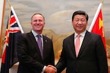 New Zealand's prime minister John Key welcomes Chinese president Xi Jinping to Wellington