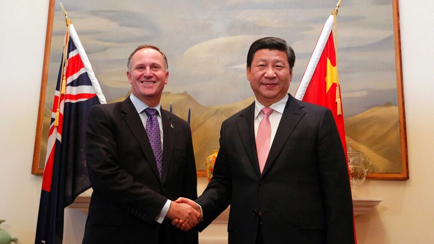 New Zealand's prime minister John Key welcomes Chinese president Xi Jinping to Wellington