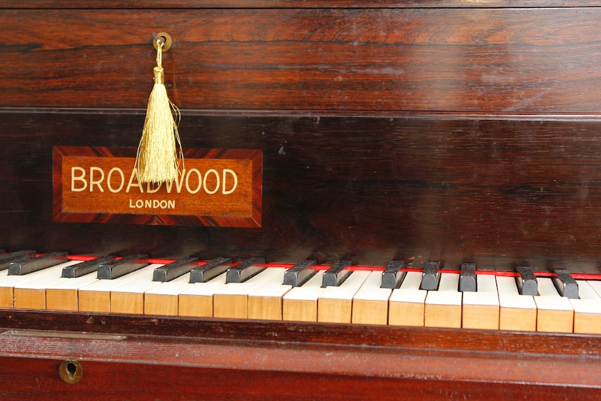 Close up of old piano keyboard