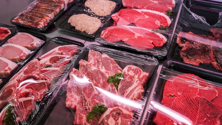 Steak, chops and pork on display in butcher's window