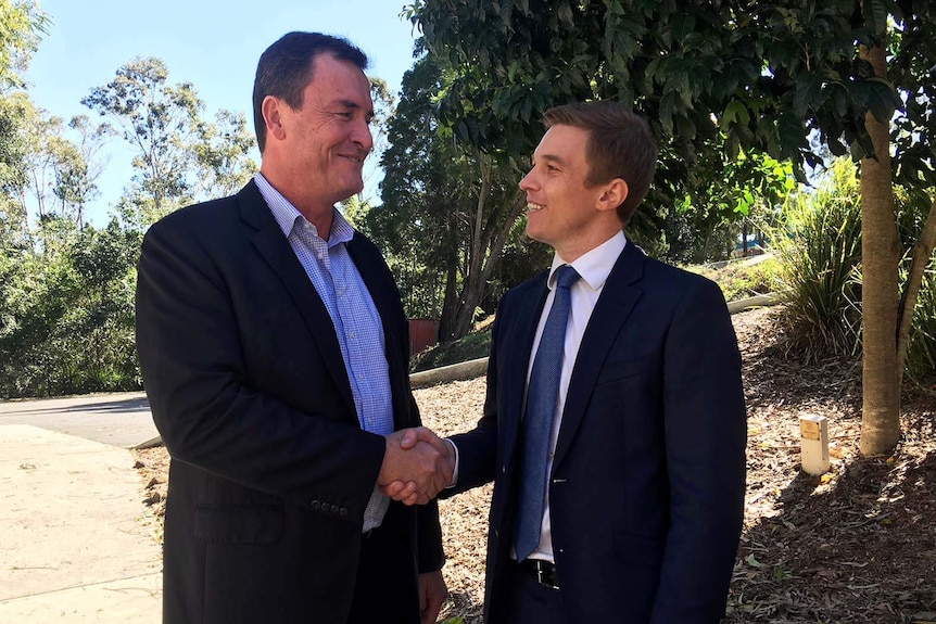 LNP Queensland president Gary Spence congratulating Julian Simmonds