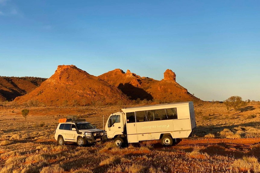 A photo of the Sandrifter Safaris fleet in a scenic location in the desert.