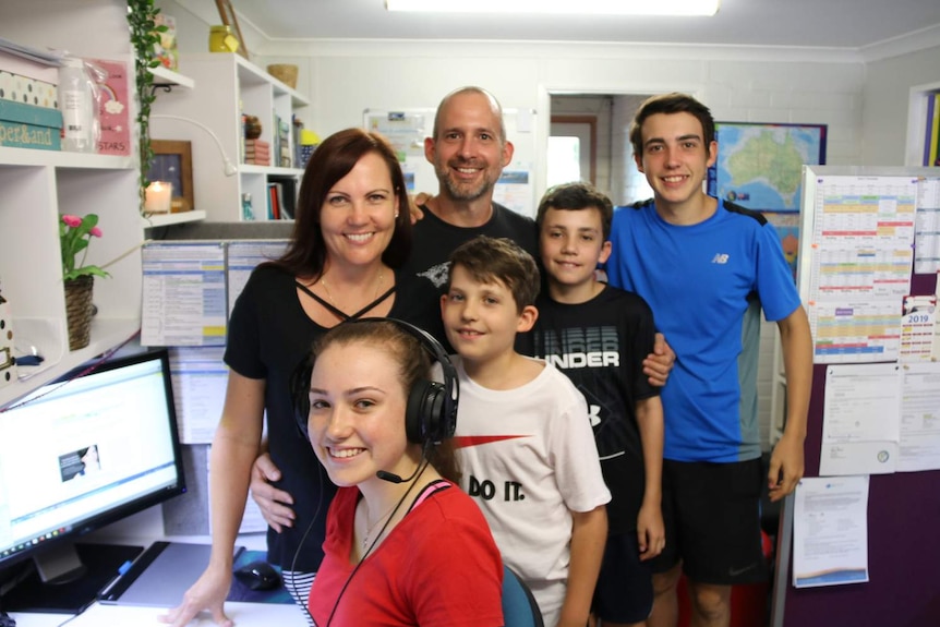 Amanda, Sophie, John, Ryan, Jack, and Harry Steptoe in their home classroom.