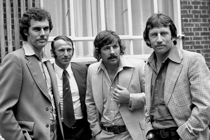 Greg Chappell, Doug Walters, Rod Marsh and Ian Chappell wearing suits
