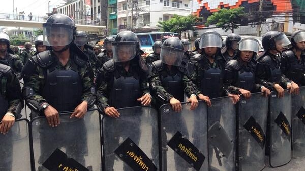 Thai military line up in Bangkok as protests continue against coup