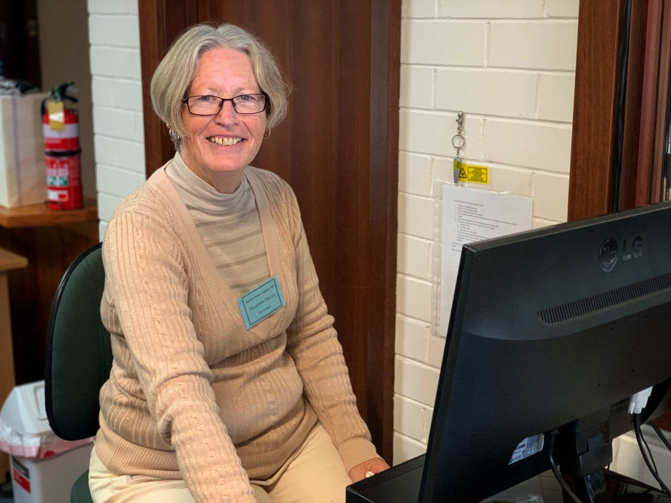 Bunbury Seniors Computer Club secretary Maureen Davies sitting at a computer at the club.