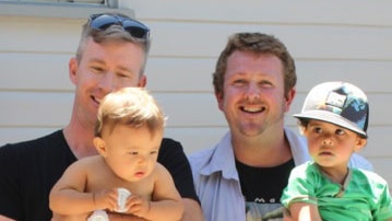 William Taylor and Michael Bishop with their sons Louie and Harry.