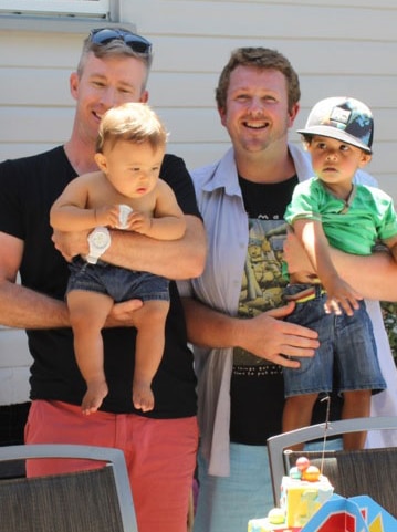 William Taylor and Michael Bishop with their sons Louie and Harry.